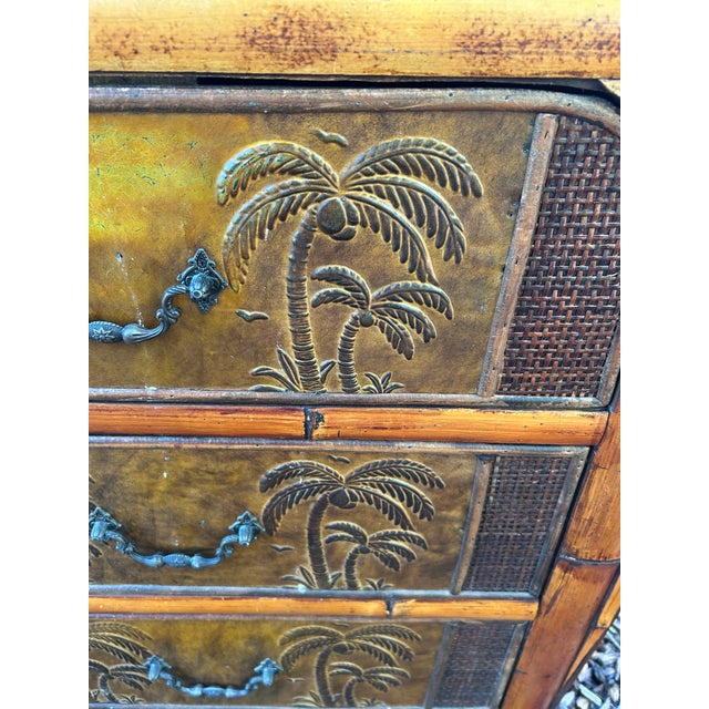 Very unusual stylish small rattan and bamboo chest of drawers having embossed decoration on the top and 3 drawers with...