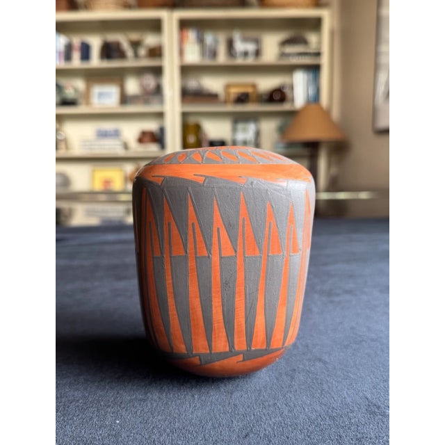 Unusual hand crafted Mata Ortiz vessel by Armando Silveira Jr., featuring a distinctive rounded rectangular form measuring...