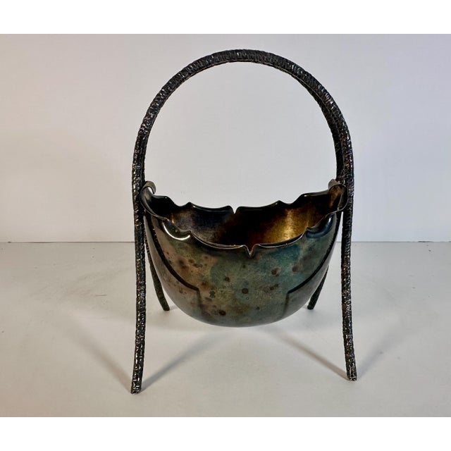 Rare & Original Hukin & Heath Silverplate Basket after a design by Christohper Dresser for your consideration. The basket...
