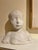 This sweet bust of a little boy is done in plaster and has delicate features. It’s the portrait of a boy probably 6 or 7...