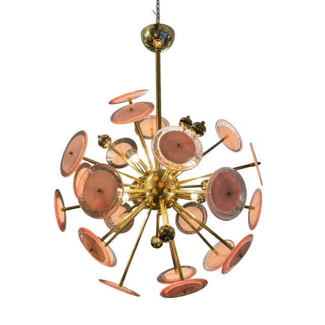 Murano glass ceiling lamp in a spectacular deep pink hue with a gold frame. This Sputnik lamp features various brass rods...
