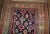 Antique handmade Caucasian Gendje rug in good condition. The rug has dark blue field covered in tribal figures, made in...