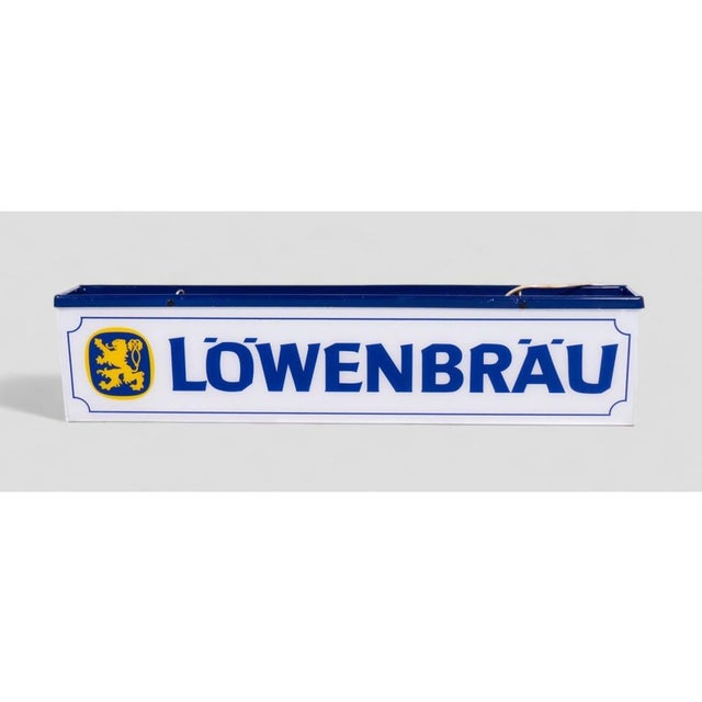 Add a vintage touch to your space with this original lighted sign from the famous Löwenbräu beer brand. Made of plastic...