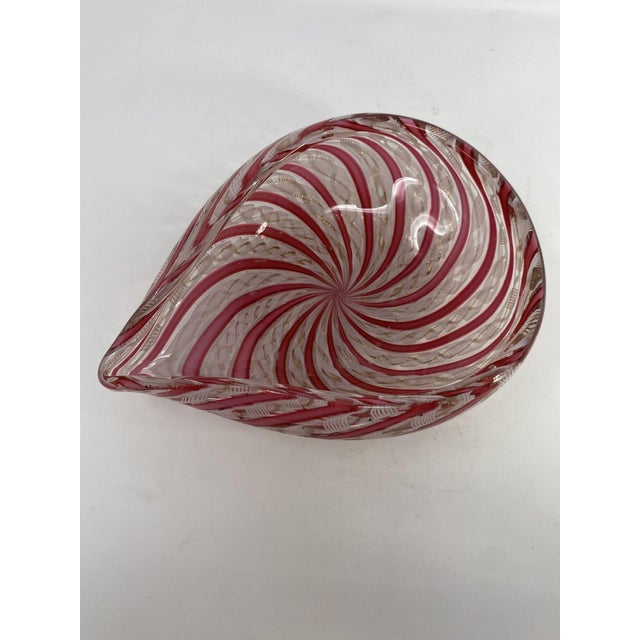 Very unusually shaped example of vintage Murano Glass. Beautiful color and detail with avventurine gold accents. Measures...