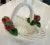 This charming handcrafted ceramic basket appears to be a fine example of Italian ceramic artistry, possibly from Lanzarin...