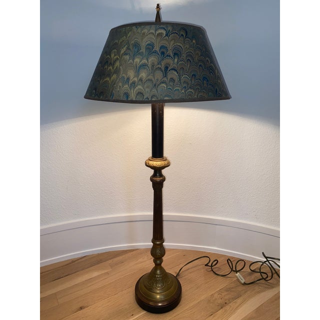 Exquisite John-Richard heavy brass candlestick lamp. A black drip look candle sits on top of a heavy detailed brass...