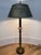 Exquisite John-Richard heavy brass candlestick lamp. A black drip look candle sits on top of a heavy detailed brass...