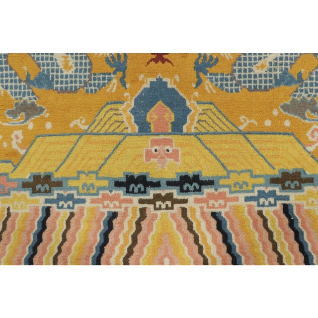 This 5x11 antique Chinese Ningxia pillar rug, hand-knotted in wool circa 1920–1939, features a powerful dragon, auspicious...