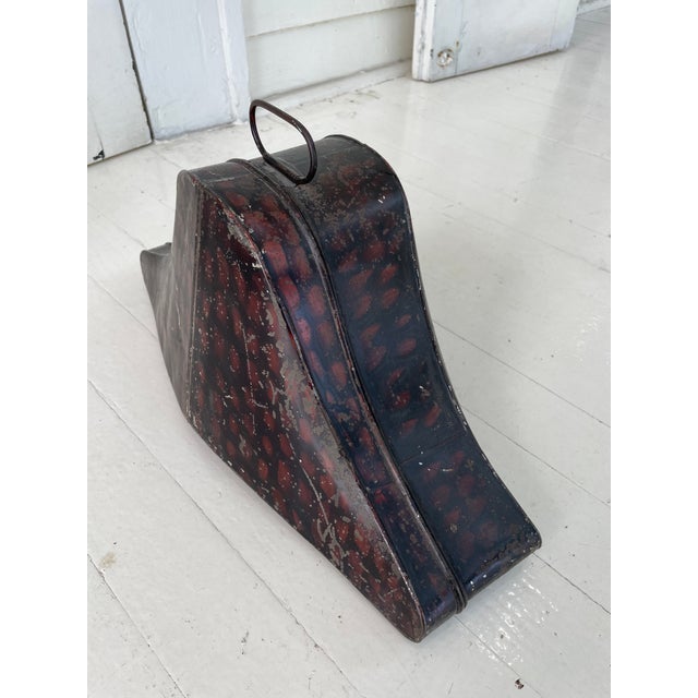 A charming 19th-century tole naval bicorne hat box, c.1850, with a faux tortoiseshell painted finish. It's fun to compare...