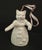 White cat shaped bell wearing a floral dress and ballerina slippers. Pink ribbon for hanging. Measures approximately 2” x...