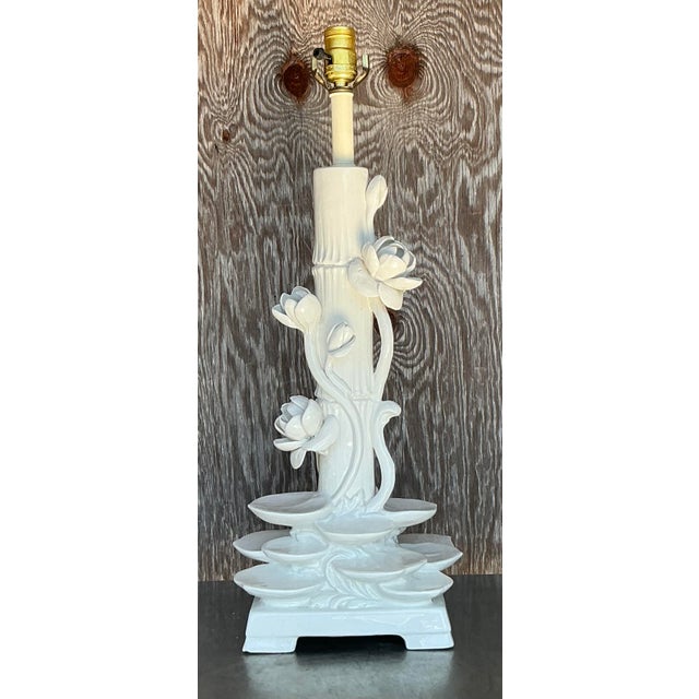 Add timeless elegance to your space with this exquisite vintage Regency-style ceramic lamp. This stunning piece features a...