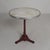 Elegant bistro table from the 1920s with robust cast iron legs and a luxurious marble top. The round marble top rests in...