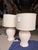 This coastal-contemporary table lamp brings relaxed sophistication to any space. Featuring a textured cream and soft...