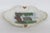 This lovely Small Decorative Dish is made of Porcelain. This piece has a wonderful painted center motif depicting the...