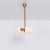 Brass 4 opal bulb chandelier by schwung dimensions: d 31.4 x w 27.3 x h 117.4 cm materials: solid brass, triplex opal...