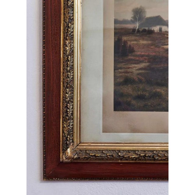 The impressive romantic landscape scene entitled "mittag in der heide" (czech: "noon on the heath") depicts a winding road...