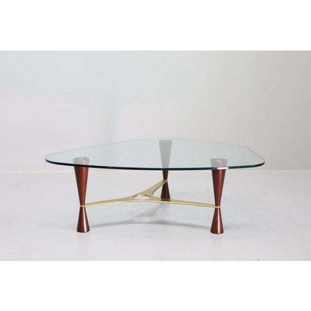 Rare Model 5309 coffee table by Edward Wormley for Dunbar. A combination of wood and brass with the original glass top. I...