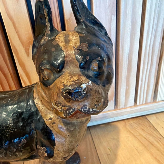 Antique cast iron French bulldog doorstop dating to the early 20th century (circa 1915–1935). Heavy, solid construction...