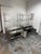 Design Plus Gallery presents a Pair of Stainless-Steel Rolling Cabinets by Shampaine Co. of St. Louis. Each cabinet is...