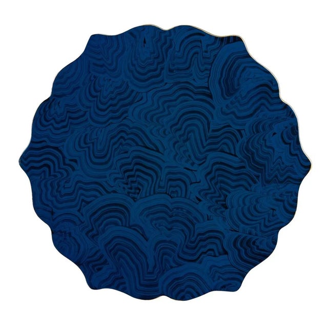 Crafted of iron with a gold leaf finish, this table features a lacquer top with a hand painted blue lapis design. Ideal...