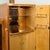 A superb art deco cocktail cabinet by harry & lou epstein. Central cocktail compartment opens to reveal a peach glass...