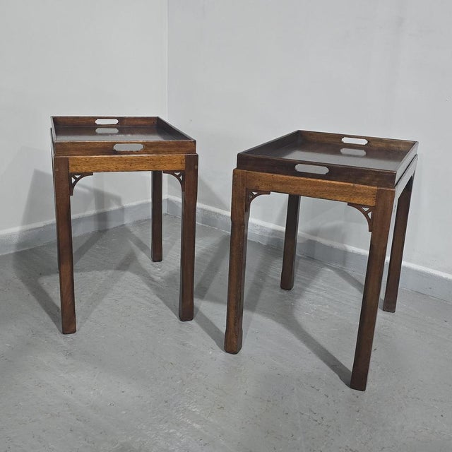 A super pair of mahogany Chippendale style lamp tables, designed with removeable trays, in very good overall condition....