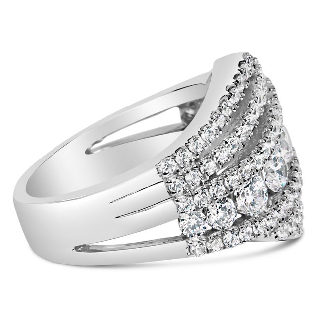 Immerse yourself in the elegance of this .925 sterling silver band ring, bathed in the sheen of rhodium plating for...