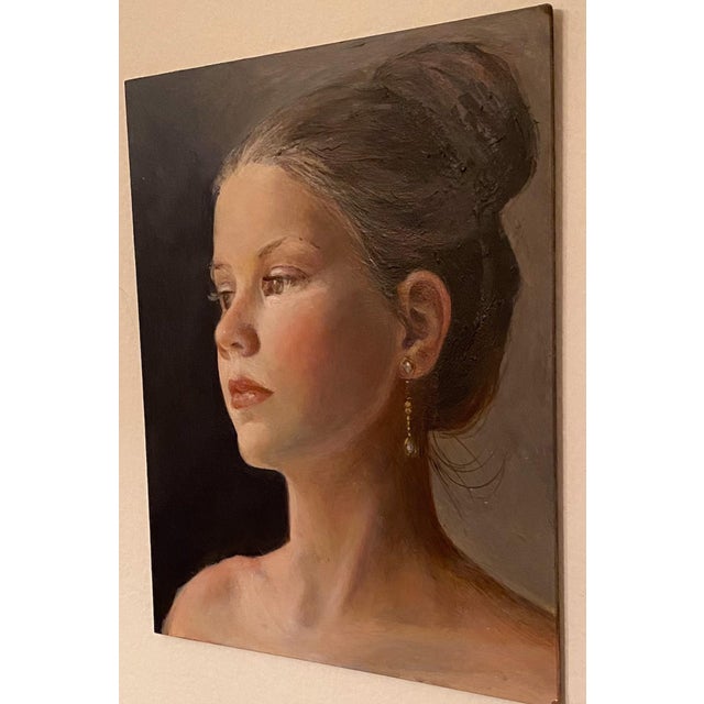 Figurative Catherine by Katalin Studlik | Acrylic on board portrait of a young woman with earrings For Sale - Image 3 of 3