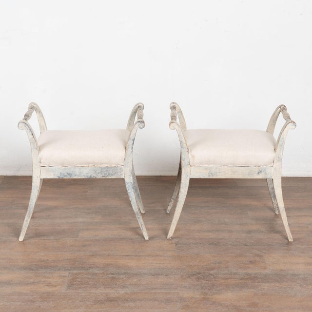 This lovely set of Swedish stools or tabourets have graceful, slightly curved legs which add an elegant touch to the pair....