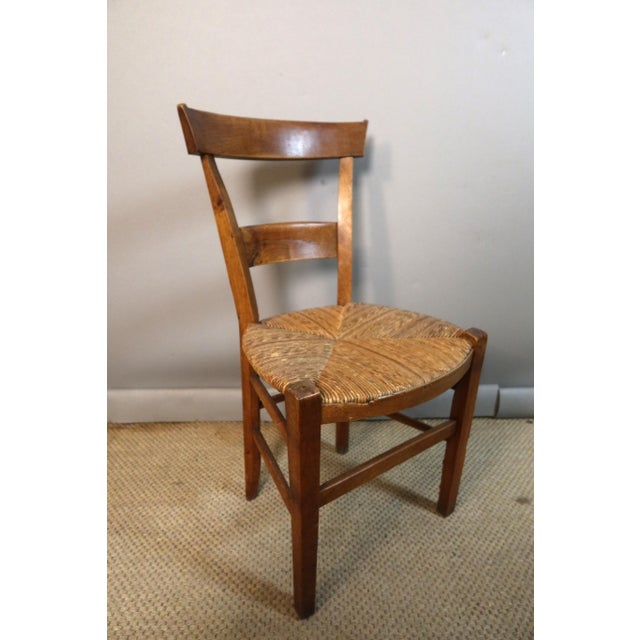 Set of ten walnut chairs with straw seats, in their original condition. 19th century. DIMENSIONS: 0.42m wide, 0.39m deep,...