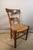 Set of ten walnut chairs with straw seats, in their original condition. 19th century. DIMENSIONS: 0.42m wide, 0.39m deep,...