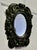 Gothic Carved Oak Oval Mirror A lovely piece, the wide frame has a beautifully carved border decorated with Roses and a...