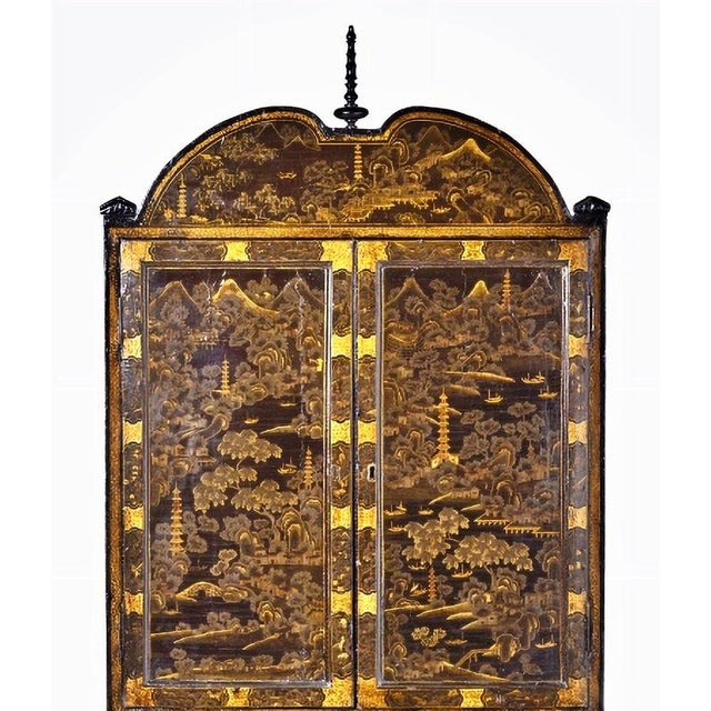 English, 18th century. in lacquered wood. Gold decoration representing pagodas and river landscapes. Friezes with plant...