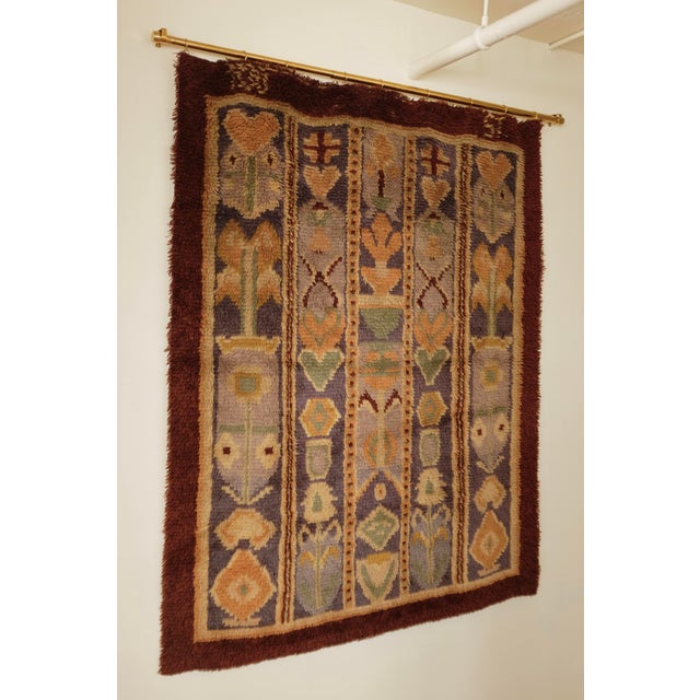 Impressive Large Finnish Mid-Century Rya Tapestry in a folk pattern design called Uurainen. The design has a dark red...