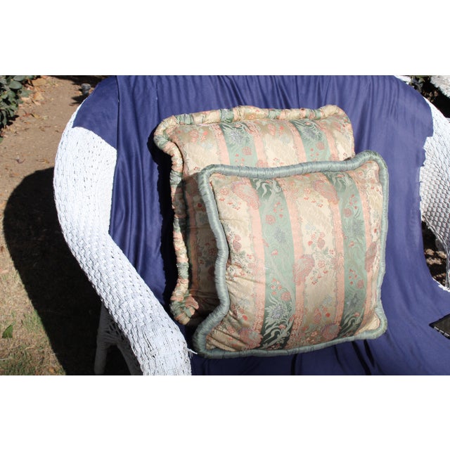 This is a pair of mid 20th century pillows. Two different sizes - possibly made from Italian Scalamandre fabric. first...
