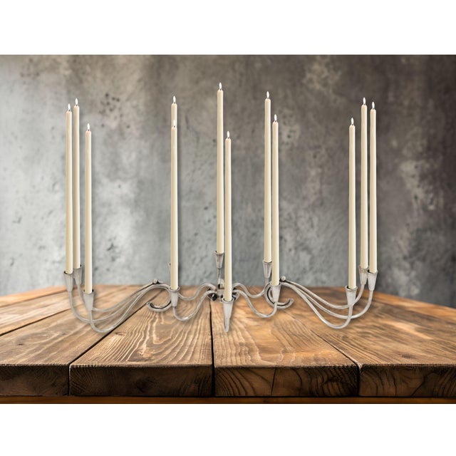 Mid 20th century Danish silverplate candle holders designed by Carl Frederik Christiansen. This sculptural three-piece set...
