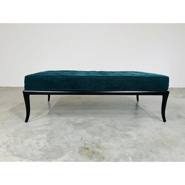 Mid-Century Modern Sabre leg bench having ebonized cherry wood frame under a newly upholstered velvet bench seat with...