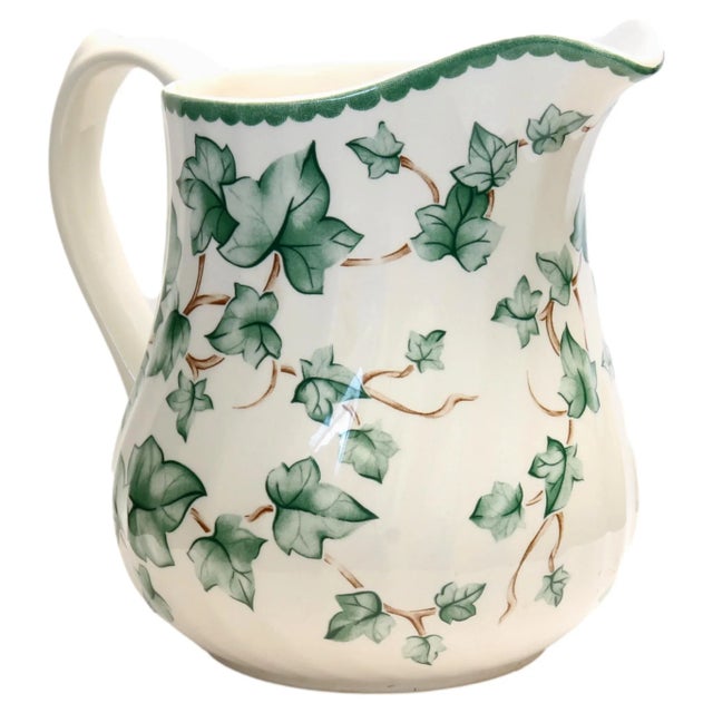 Vintage English pitcher with ivy leaf detail. England stamped on underside.