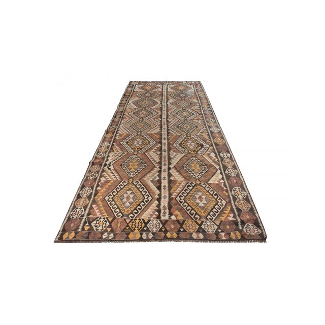 Vintage handwoven decorative kilim rug from Kars region of Turkey. Approximately 50-60 years old. In very good condition.