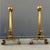 Expertly crafted and elegantly designed, this set of Grand Antique Brass Columnar Andirons with Cannonball Finial will add...