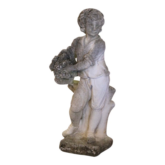 Early 20th Century French Stone Garden Statue of Young Boy Holding Grapes For Sale