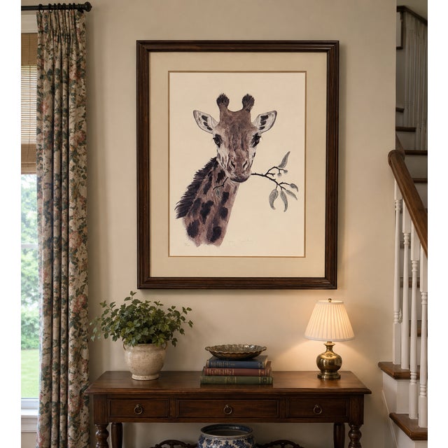 An impressive signed limited edition lithograph titled "Giraffe" by wildlife artist Jacquie Marie Vaux, dated 1975. This...