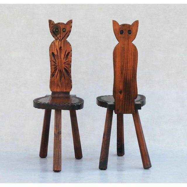 Rare pair of Spanish Brutalist Cat tripod chairs, C1950s. A quirky duo of handcrafted gouge-work, folding feline chairs...