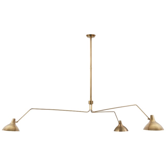 Charlton Grande Triple Arm Chandelier in Hand-Rubbed Antique Brass Designer: AERIN Fixture Height: 13" Min. Custom Height:...