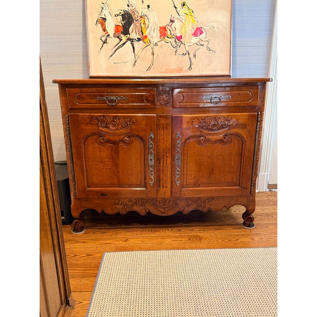 19th Century Swiss Sideboard Antique sideboard, understood to be from Switzerland. Features carved panel doors and...