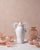 The "Marria" Ceramic Vase by Valentina Cameranesi & Walter Usai is a sculptural white ceramic vase that reimagines the...