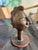 Rare round side table with bronze frame and an expressive figurative bronze head. Probably custom-made. Italy 60s. The...