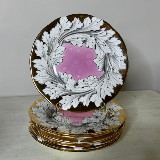 An incredible set of extremely rare salad or dessert plates, very much in the style of Fornasetti, designed and created by...