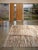 Premium Beni Mrirt Rug | Handwoven Berber Wool Rug with Natural Beige and Taupe Striped Texture This understated premium...