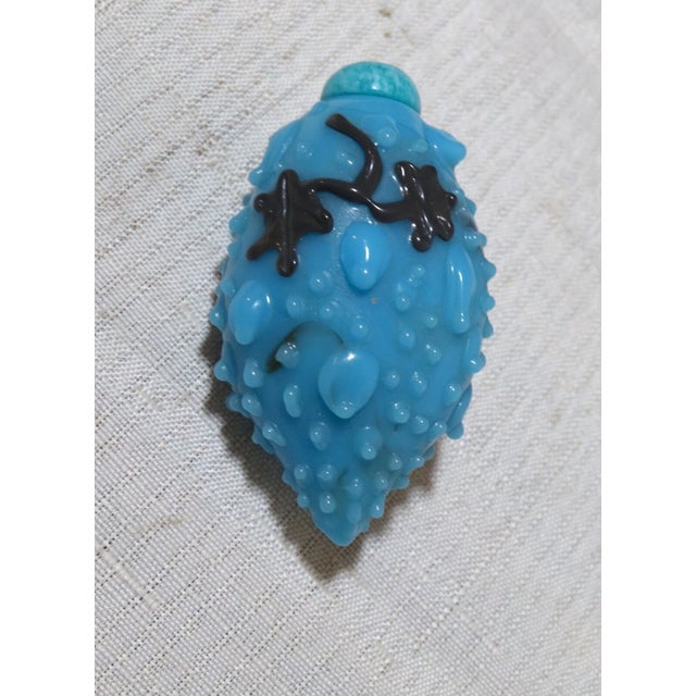 Up for sale is a rare antique Chinese handmade fruit shaped snuff bottle. It's blown by hand out of a vibrant blue color...